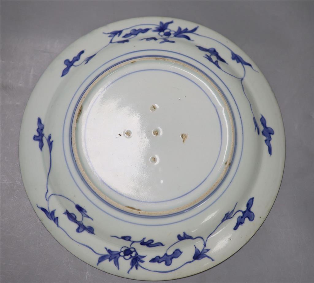 An 18th century Japanese Arita blue and white plate, spurs marks, diameter 26cm